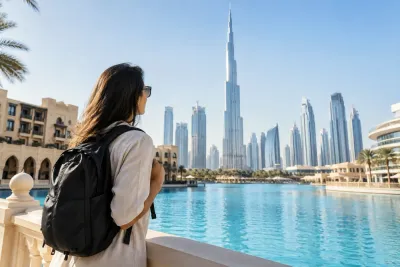 Solo traveller with backpack viewing the Burj Khalifa